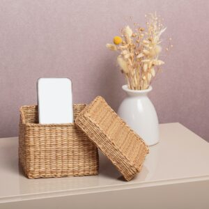 Smartphone is in separate wicker box on table